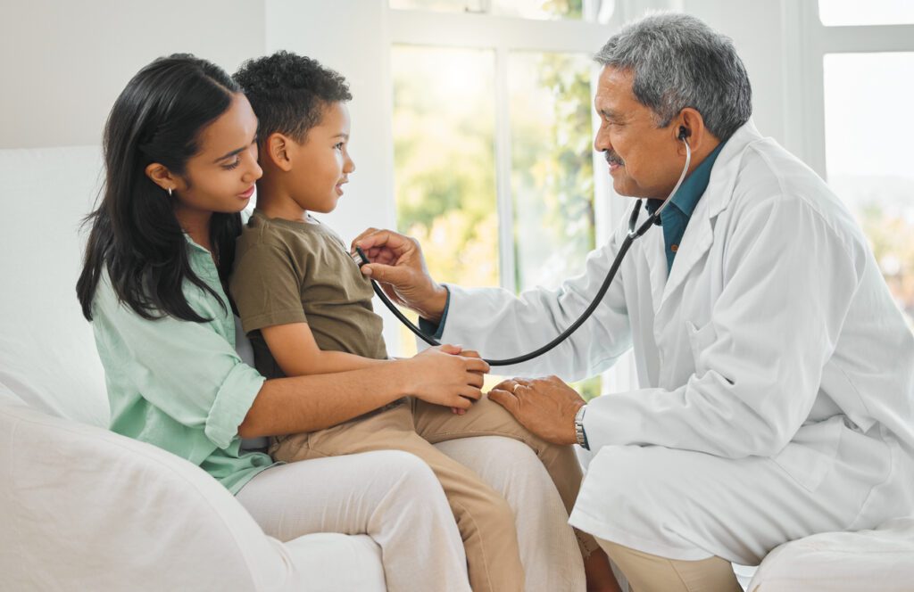 Healthcare professional supporting a patient during care